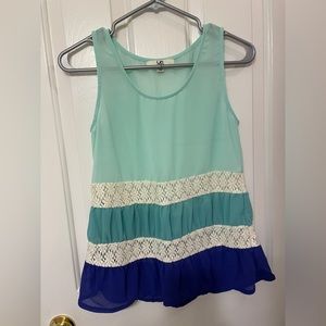 Turquoise and blue tank. Size small. Runs small.